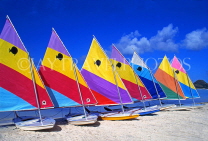 ANTIGUA, West Coast, row of sailboats lined up along beach, ANT758JPL