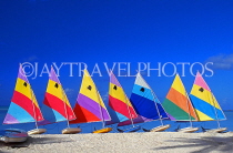 ANTIGUA, West Coast, row of sailboats lined up along beach, ANT759JPL