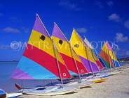 ANTIGUA, West Coast, row of sailboats on beach, ANT657JPL