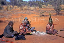 AUSTRALIA, Northern Territory, ALICE SPRINGS, Aboriginal People around fire, AUS758JPL