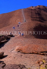 AUSTRALIA, Northern Territory, AYERS ROCK (Uluru), visitors climbing rock face, AUS357JPL