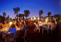 AUSTRALIA, Northern Territory, Ayers Rock site, tourists at 'Sound of Silence' dinner in desert, AUS372JPL