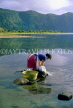 AZORES, Sao Miguel Island, Sete Cidades volcanic lake, woman washing clothes, AZ388JPL