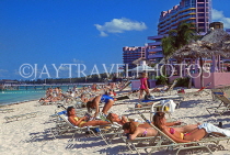 BAHAMAS, New Providence Island, Cable Beach, sunbathers, BAH239JPL