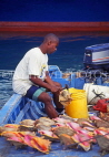 BAHAMAS, New Providence Island, Nassau, Potters Cay, fisheman cleaning conch shells, BAH177JPL