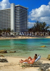 BAHAMAS, Paradise Island, beach and couple sunbathing, BAH367JPL