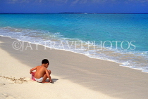 BAHAMAS, Paradise Island, boy playing on beach, BAH261JPL