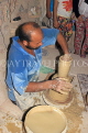 BAHRAIN, A'Ali Pottery Centre (Village), potter at work, BHR518JPL