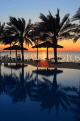 BAHRAIN, Al Jasra, house outdoor pool, palm trees and sunset, BHR1752JPL
