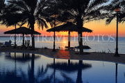 BAHRAIN, Al Jasra, house outdoor pool, palm trees and sunset, BHR1753JPL