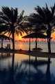 BAHRAIN, Al Jasra, house outdoor pool, palm trees and sunset, BHR1754JPL
