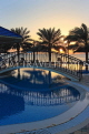 BAHRAIN, Al Jasra, house pool and terrace by the sea, sunset view, BHR1540JPL