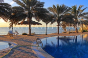 BAHRAIN, Al Jasra, house pool and terrace by the sea, sunset view, BHR1813JPL