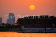 BAHRAIN, Manama, King Faisala Corniche, Sunset over Reef Island, BHR726JPL
