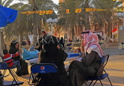 BAHRAIN, Manama, outdoor cafe scene, family around table, BHR1196JPL