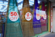 BAHRAIN, Muharraq, Souk (souq), shop front and saris, BHR853JPL