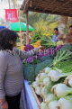 BAHRAIN, Noor El Ain, Garden Bazaar, Farmers Market, shopper at vegetable stall, BHR1161JPL