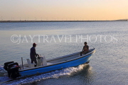 BAHRAIN, coast by Al Jasra, fishing boat going out to sea, BHR1396JPL