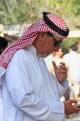 BAHRAIN, man in traditional Arab Keffiyeh attire, BHR1338JPL