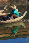 CAMBODIA, Siem Reap, Angkor Wat, moat cleaner in boat, CAM558JPL