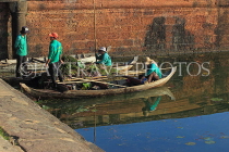 CAMBODIA, Siem Reap, Angkor Wat, moat cleaners in boat, CAM557JPL