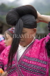 CHINA, Guangxi Province, Guilin, Red Yao woman coiling her long hair, CH1526JPL