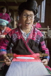 CHINA, Guangxi Province, Guilin, Red Yao woman weaving, CH1530JPL