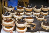 CHINA, Guangxi Province, Guilin, ceramic pots with cooked rice at streetside diner, CH1489JPL
