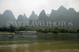 CHINA, Guangxi Province, Guilin, limestone outcrops and cruise boat on River Li, CH1574JPL