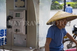 CHINA, Guangxi Province, Guilin, the old and the new, farmer and payphone, CH1651JPL