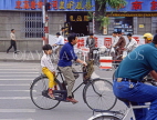 CHINA, Hebei Province, CHENGDE, cyclist with child on back seat, CH1379JPL