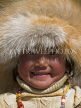 CHINA, Sichuan Province, Daocheng, Yading, Tibetan girl with fur hat, CH1482JPL
