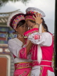 CHINA, Yunnan Province, Dali, Bai girls in costume getting dressed, CH1558JPL