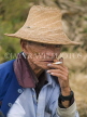 CHINA, Yunnan Province, Dali, Old man smoking, CH1469JPL