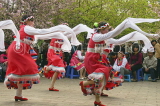 CHINA, Yunnan Province, Kunming, Green Lake Park, cultural dancers, CH1611JPL