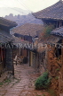CHINA, Yunnan Province, Lijiang, old town street and wooden houses, CH1076JPL