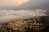 CHINA, Yunnan Province, Yuanyang, Duiyoshu, sunrise over water filled rice terraces, CH1619JPL