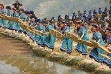 CHINA, Yunnan Province, Yuanyang, Hani (Akha) women sifting rice, during a festival, CH1626JPL