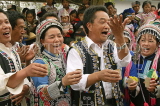 CHINA, Yunnan Province, Yuanyang, Long Table Festival, Hani (Akha) women singing a toast, CH1637JPL