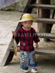 CHINA, Yunnan Province, Yuanyang, little boy and a fish, CH1521JPL