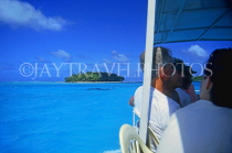 COOK ISLANDS, Aitutaki Islands, tourists in boat, on tour, CI142JPL