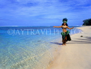 COOK ISLANDS, Rarotonga, beach, Maori dancer in traditional island dress, CI757JPL