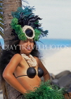 COOK ISLANDS, Rarotonga, beach, Maori dancer in traditional island dress, CI771JPL