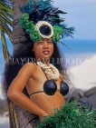 COOK ISLANDS, Rarotonga, beach, Maori dancer in traditional island dress, CI773JPL