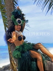 COOK ISLANDS, Rarotonga, beach, Maori girl in traditional island dress, CI769JPL
