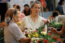 CROATIA, Dubrovnik, Old Town, market scene, people at flower stall, CRO429JPL