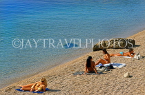 CROATIA, Dubrovnik, beach by the Old Town area, and sunbathers, CRO448JPL