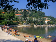 CROATIA, Elaphite Islands (Dubrovnik Coast), KOLOCEP, beach and sunbathers, CRO371JPL