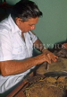 CUBA, Havana, man hand making cigars, CUB132JPL