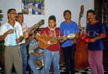 CUBA, Havana, musicians entertaining in a bar, CUB131JPL